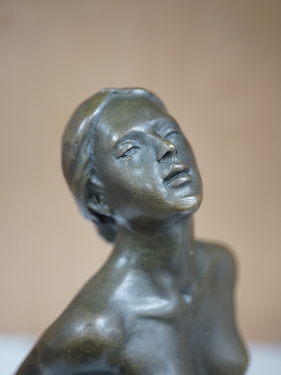 After Jean Patoue (1887 - 1936), a small bronze study of a bound nude lady, J.B. Deposse foundry mark, 21cm. Condition - base has crack around the entire diameter, possibly restored.